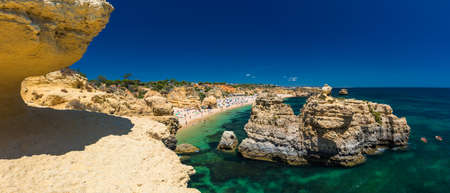 Aerial panoramic view of amazing Praia dos Paradinha beach, Albufeira, Algarve, Portugalの写真素材