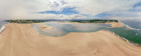 Aerial panoramic view of Foz do Arelho beach during summer, Portugalの写真素材