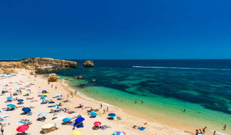 Aerial panoramic view of amazing Praia dos Paradinha beach, Albufeira, Algarve, Portugalの写真素材