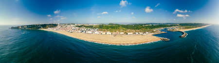 Aerial drone panorama view of Nazare, Portugal - town, ocean and beachの写真素材