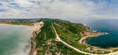 Aerial view over the village and bay of SÃ£o Martinho do Porto, west Portugalの写真素材