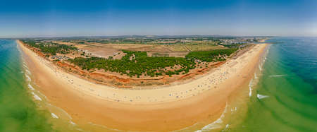 Aerial drone beach view of Vilamoura and Praia de Falesia, Algarve, Portugalの写真素材
