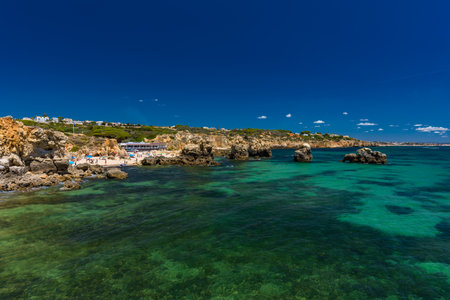 Aerial panoramic view of amazing Praia dos Paradinha beach, Albufeira, Algarve, Portugalの写真素材