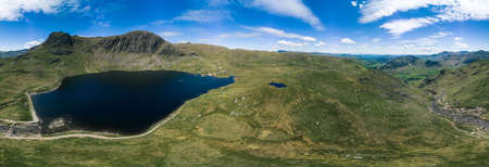 Aerial view of Stickle Tarn lake, the Lake District, Great Langdale valley, Cumbriaの写真素材
