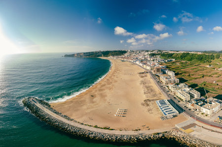 Aerial drone panorama view of Nazare, Portugal - town, ocean and beachの写真素材