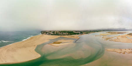 Aerial panoramic view of Foz do Arelho beach during summer, Portugalの写真素材