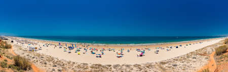 Aerial drone beach view of Vilamoura and Praia de Falesia, Algarve, Portugalの写真素材
