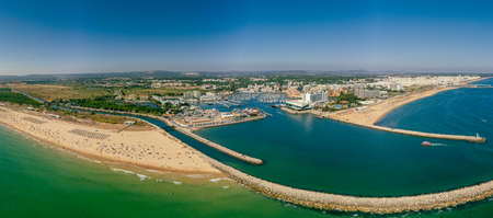 Aerial drone beach view of Vilamoura and Praia de Falesia, Algarve, Portugalの写真素材