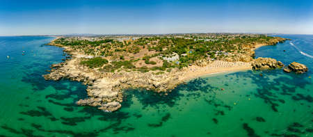 Panoramic aerial drone view of popular Praia do Castelo beach, Albufeira, Algarve, Portugalの写真素材