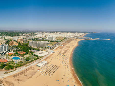 Aerial drone beach view of Vilamoura and Praia de Falesia, Algarve, Portugalの写真素材