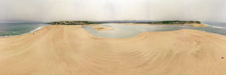 Aerial panoramic view of Foz do Arelho beach during summer, Portugalの写真素材