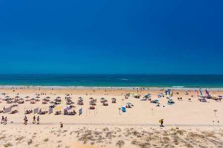 Aerial drone beach view of Vilamoura and Praia de Falesia, Algarve, Portugalの写真素材