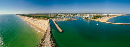Aerial drone beach view of Vilamoura and Praia de Falesia, Algarve, Portugalの写真素材