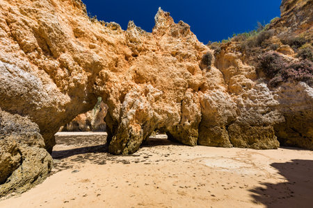 Aerial and panoramic view of Praia dos Tres Irmaos beach, Alvor, Algarve, Portugalの写真素材