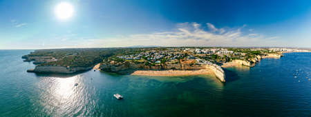 Aerial drone panoramic views of Praia Nova and Praia de Nossa beach, Algarve, Portugalの写真素材