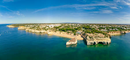 Aerial drone panoramic views of Praia Nova and Praia de Nossa beach, Algarve, Portugalの写真素材