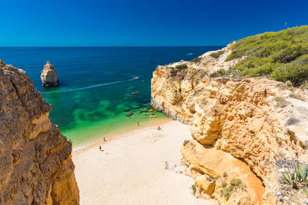 Aerial drone views of Praia da Marinha and Malhada do Baraco - beaches in Algarve, Portugalの写真素材