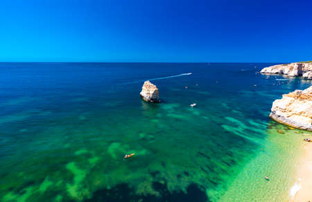 Aerial drone views of Praia da Marinha and Malhada do Baraco - beaches in Algarve, Portugalの写真素材