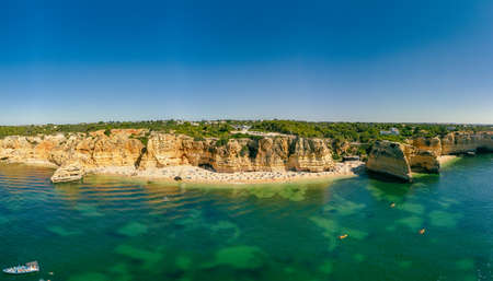Aerial drone views of Praia da Marinha and Malhada do Baraco - beaches in Algarve, Portugalの写真素材