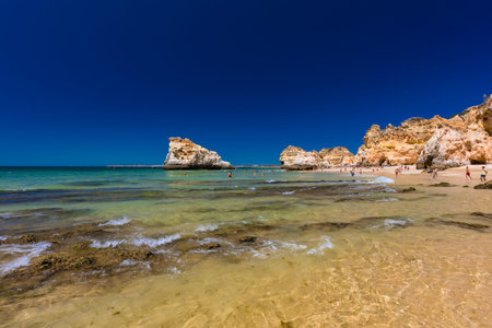 Aerial and panoramic view of Praia dos Tres Irmaos beach, Alvor, Algarve, Portugalのeditorial素材