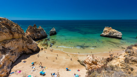 Aerial and panoramic view of Praia dos Tres Irmaos beach, Alvor, Algarve, Portugalのeditorial素材