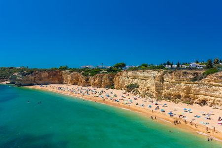 Aerial drone panoramic views of Praia Nova and Praia de Nossa beach, Algarve, Portugalのeditorial素材