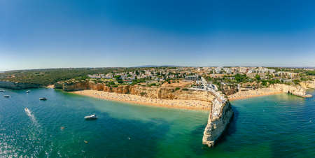 Aerial drone panoramic views of Praia Nova and Praia de Nossa beach, Algarve, Portugalのeditorial素材