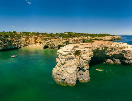 Aerial drone view of the Albandeira Beach (Praia da Albandeira) in Lagoa, Algarve, Portugalのeditorial素材