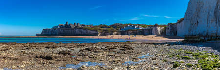 MARGATE, Kent, UK: 21 May 2020: Visitors to Margate's Main Sands beach surrounded by white cliffs during the heatwave in Britain.のeditorial素材
