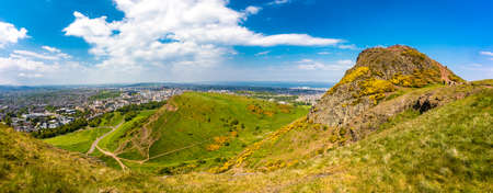 Cityscape of Edinburgh from Arthur's Seat in a beautiful summer day, Scotland, United Kingdomの写真素材