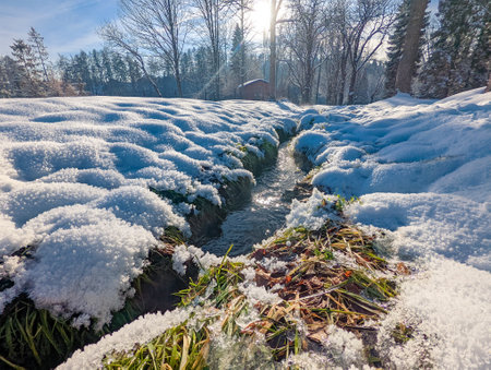 Travertine lake with hot water close to the spa Vysne Ruzbachy, Slovakia, during winterの写真素材