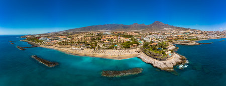 White sandy El Duque beach and coastline in Tenerife. Adeje coast Canary island, Spainの写真素材