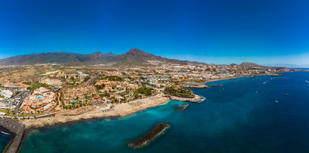 White sandy El Duque beach and coastline in Tenerife. Adeje coast Canary island, Spainの写真素材