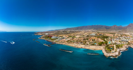 White sandy El Duque beach and coastline in Tenerife. Adeje coast Canary island, Spainの写真素材
