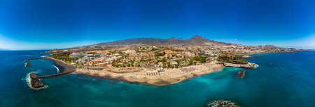 White sandy El Duque beach and coastline in Tenerife. Adeje coast Canary island, Spainの写真素材