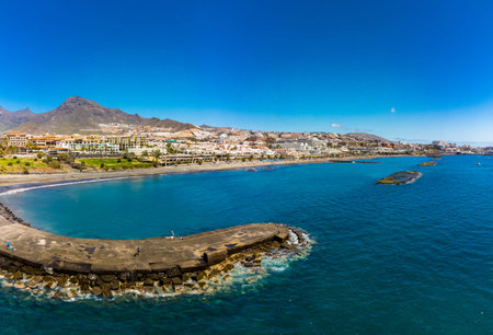 White sandy El Duque beach and coastline in Tenerife. Adeje coast Canary island, Spain