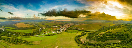 Aerial drone view of Podolinec, the town near Stara Lubovna, Slovakia, during sunsetの写真素材