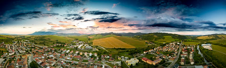 Aerial drone view of Podolinec, the town near Stara Lubovna, Slovakia, during sunsetの写真素材