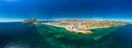 Colorful Mediterranean beach. Mountain Penyal d'Ifach. Calpe beach, Spain.の写真素材