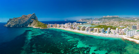 Colorful Mediterranean beach. Mountain Penyal d'Ifach. Calpe beach, Spain.の写真素材