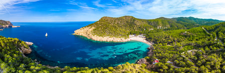 View of Cala Benirras beach with turquoise sea water, Ibiza island, Spainの写真素材