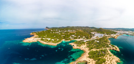 Cala Gracio and Calo el Moro beach on Ibiza island, Spain, aerial viewsの写真素材