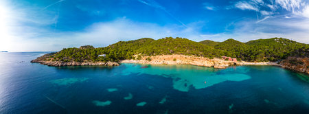 Aerial drone view of Cala Saladeta, Ibiza islands, Spainの写真素材