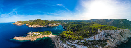 beach of Port Sant Miquel on the north shore of Ibiza island in Spainの写真素材