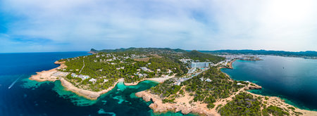 Cala Gracio and Calo el Moro beach on Ibiza island, Spain, aerial viewsの写真素材
