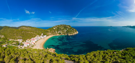 Ibiza, Balearics, Spain - Cala de San Vincente or Sant Vincent, bay with amazing beachの写真素材