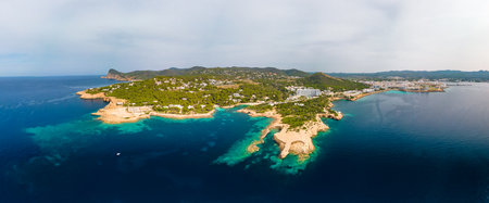 Cala Gracio and Calo el Moro beach on Ibiza island, Spain, aerial viewsの写真素材