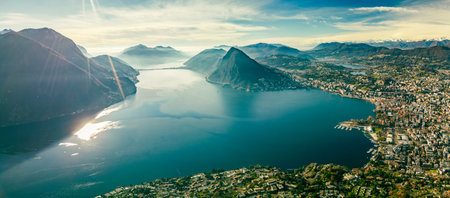 Lugano, Switzerland. Amazing aerial view of the Swiss city, surrounded by lake and mountains.の写真素材