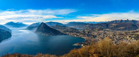 Lugano, Switzerland. Amazing aerial view of the Swiss city, surrounded by lake and mountains.の写真素材
