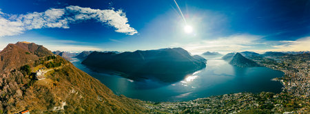 Lugano, Switzerland. Amazing aerial view of the Swiss city, surrounded by lake and mountains.の写真素材